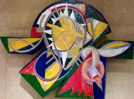 Abstract colorful geometric artwork with layered circles, triangles, and white, yellow, blue, red, and green shapes
